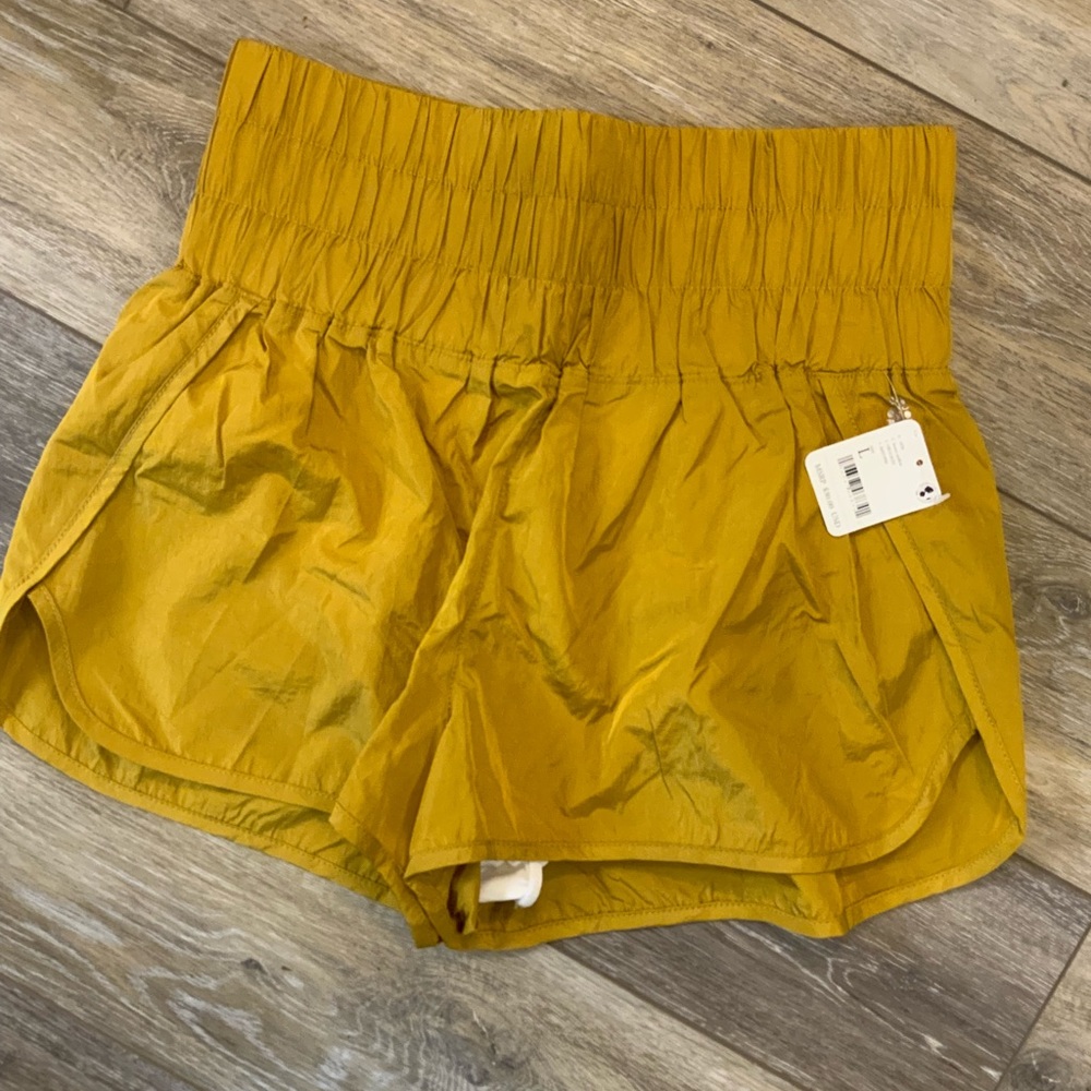 Free People Movement high waisted nylon shorts with liner. Size L